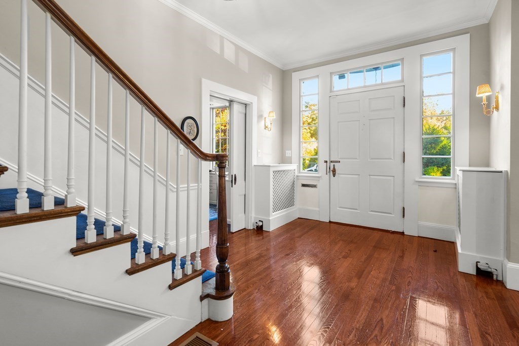 9 Livermore Road Wellesley, MA 02481 - Photo 12 of 20 a view of an entryway with wooden floor and door