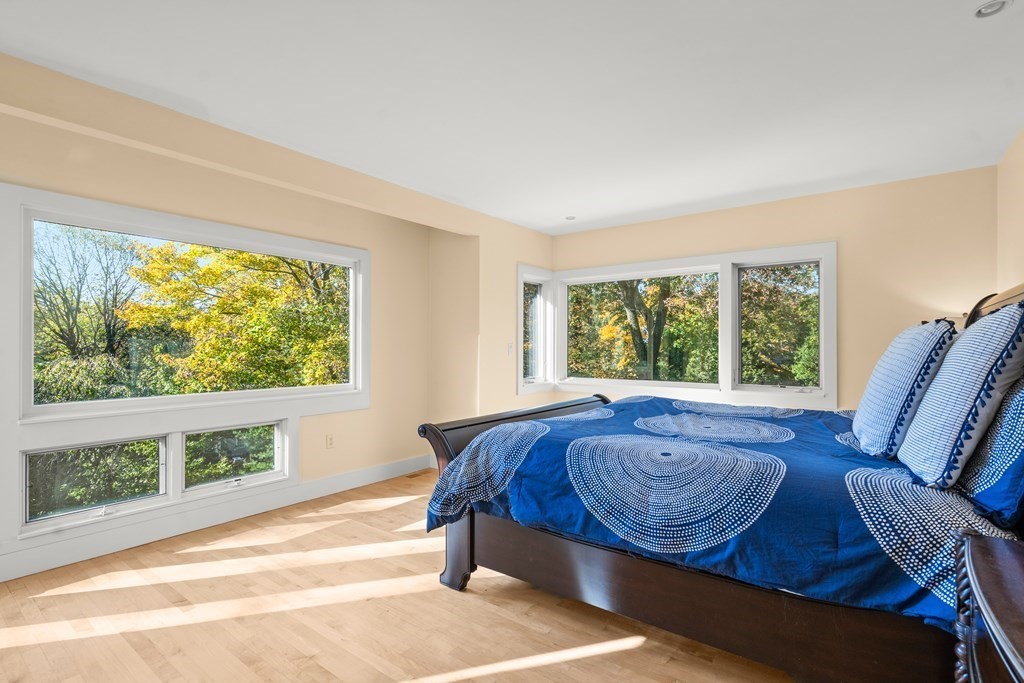 9 Livermore Road Wellesley, MA 02481 - Photo 13 of 20 a living room with furniture and a large window