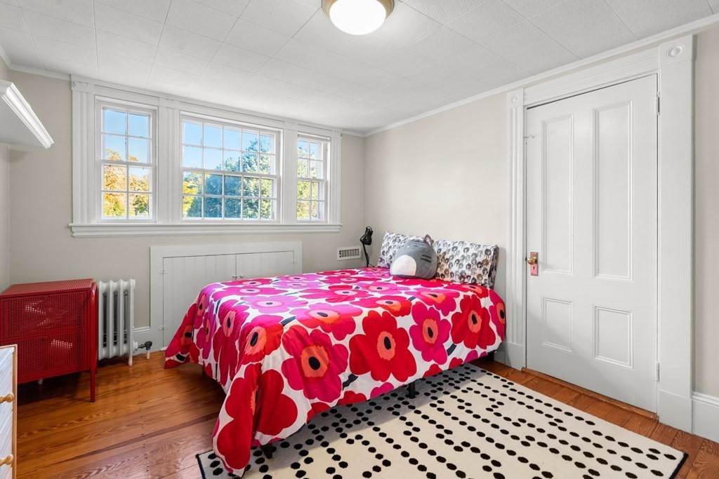 9 Livermore Road Wellesley, MA 02481 - Photo 14 of 20 a bedroom with a bed and a window