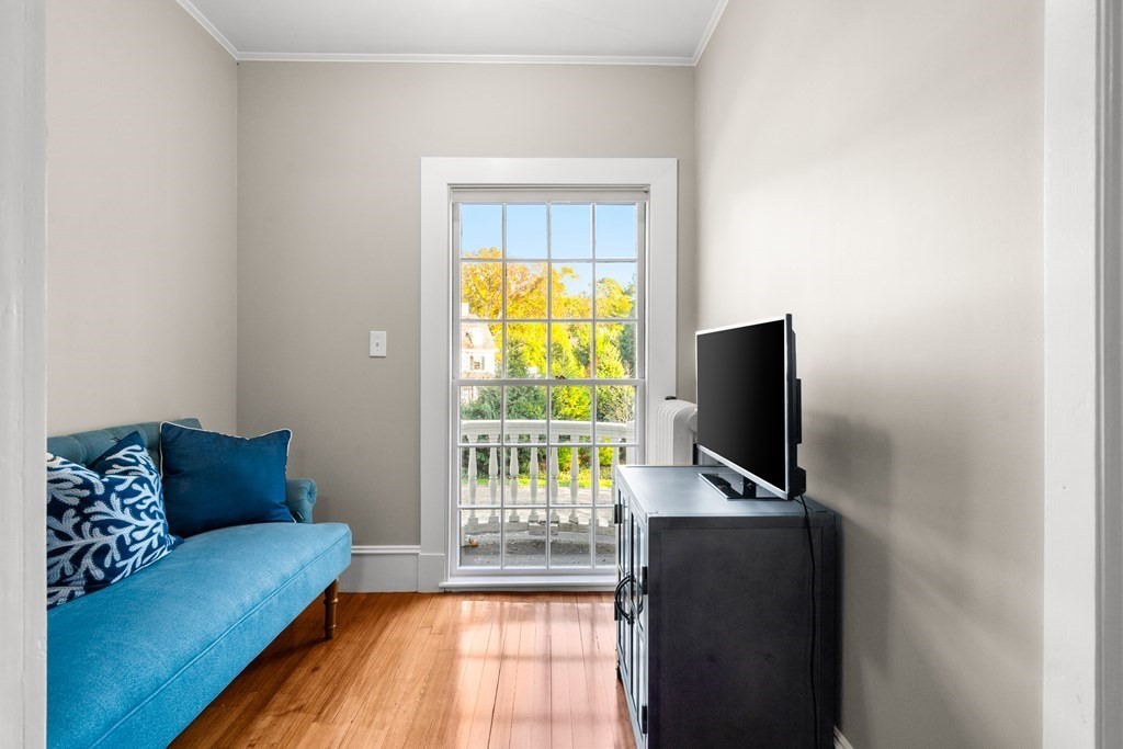 9 Livermore Road Wellesley, MA 02481 - Photo 16 of 20 a living room with furniture and a flat screen tv