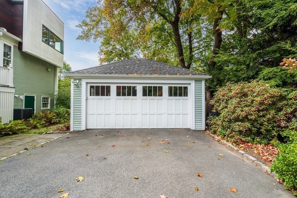 9 Livermore Road Wellesley, MA 02481 - Photo 20 of 20 a house with a tree in front of it
