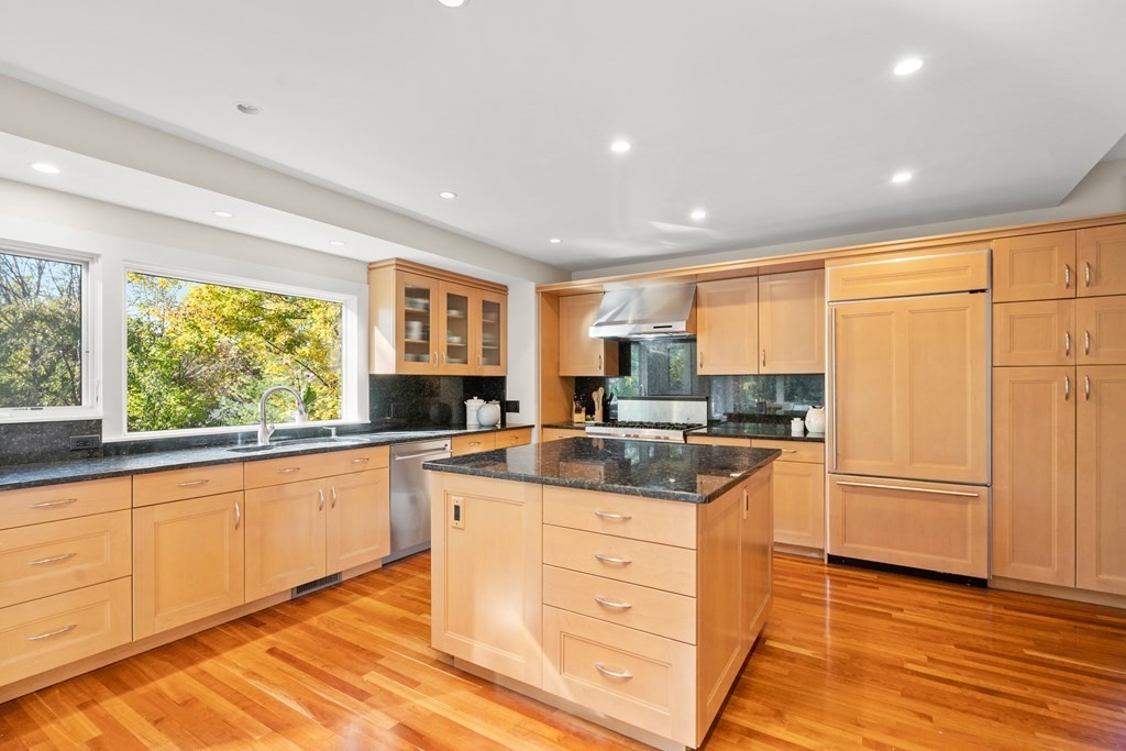 9 Livermore Road Wellesley, MA 02481 - Photo 4 of 20 a kitchen with a stove a sink and a refrigerator