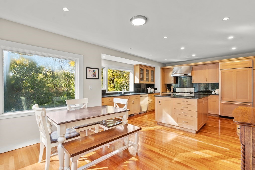 9 Livermore Road Wellesley, MA 02481 - Photo 5 of 20 a kitchen with stainless steel appliances granite countertop a stove a sink and a refrigerator