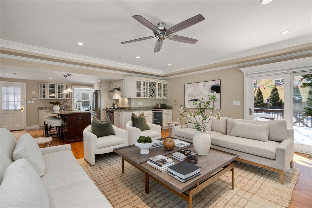 6 Boulder Brook Road Wellesley, MA 02481 - Photo 11 of 34 a living room with furniture a rug and a chandelier