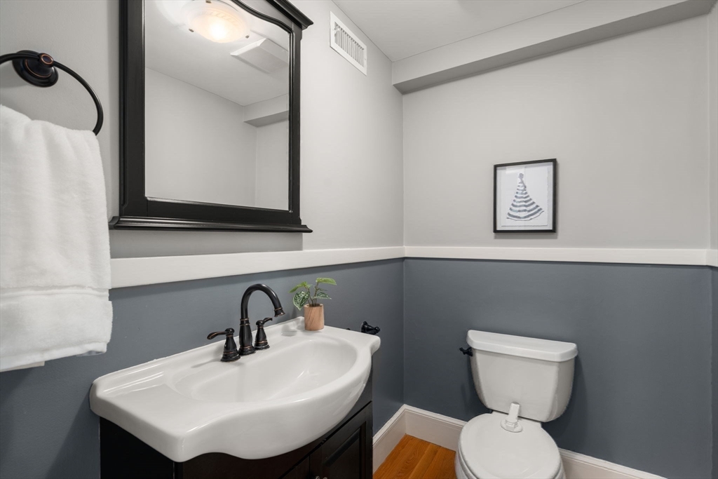 6 Boulder Brook Road Wellesley, MA 02481 - Photo 14 of 34 a bathroom with a toilet sink and mirror