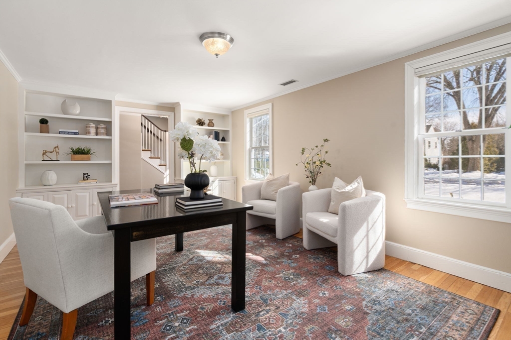 6 Boulder Brook Road Wellesley, MA 02481 - Photo 15 of 34 a living room with furniture a table and wooden floor