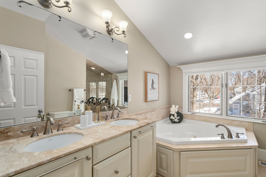 6 Boulder Brook Road Wellesley, MA 02481 - Photo 19 of 34 a bathroom with a sink double vanity granite tub and mirror