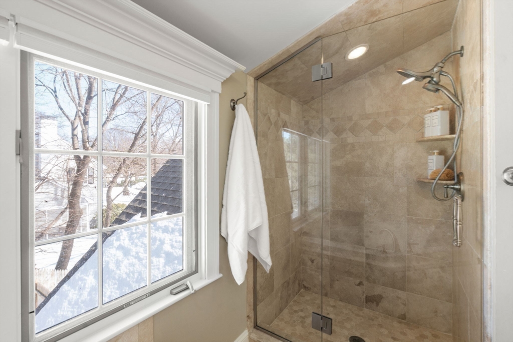 6 Boulder Brook Road Wellesley, MA 02481 - Photo 20 of 34 a bathroom with a shower and a window
