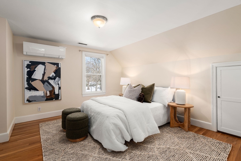 6 Boulder Brook Road Wellesley, MA 02481 - Photo 22 of 34 a bedroom with a bed and a couch