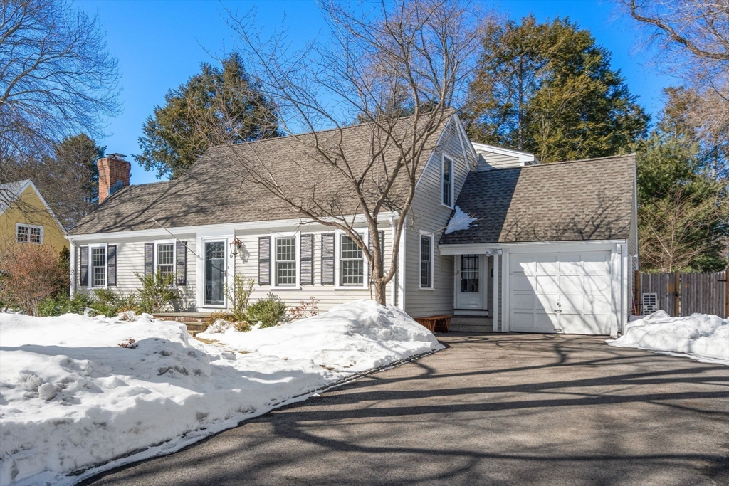 6 Boulder Brook Road Wellesley, MA 02481 - Photo 3 of 34 a front view of a house with a yard