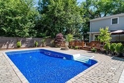 6 Boulder Brook Road Wellesley, MA 02481 - Photo 34 of 34 a view of swimming pool with chairs in patio