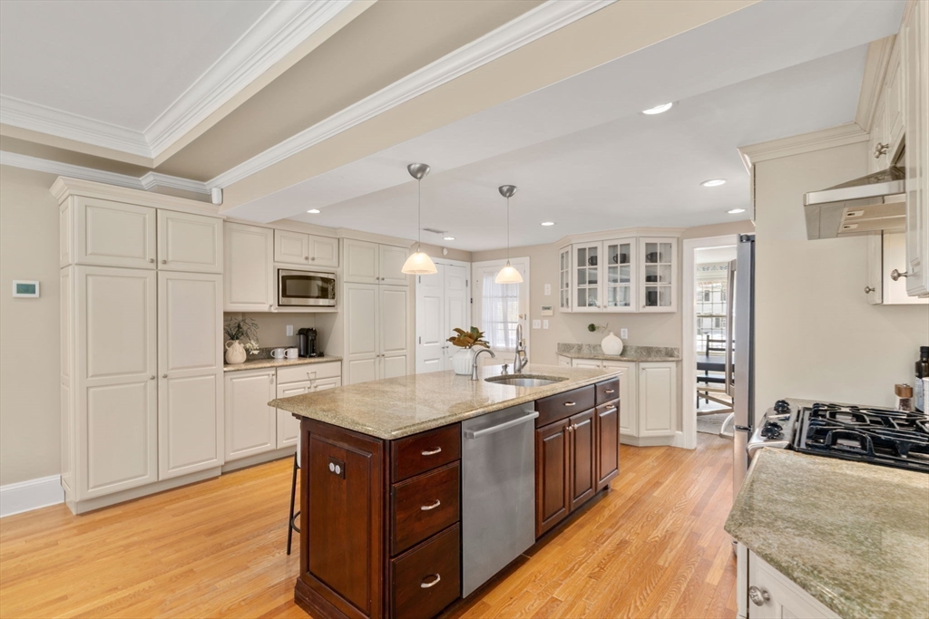 6 Boulder Brook Road Wellesley, MA 02481 - Photo 6 of 34 a kitchen with stainless steel appliances granite countertop a sink stove and refrigerator