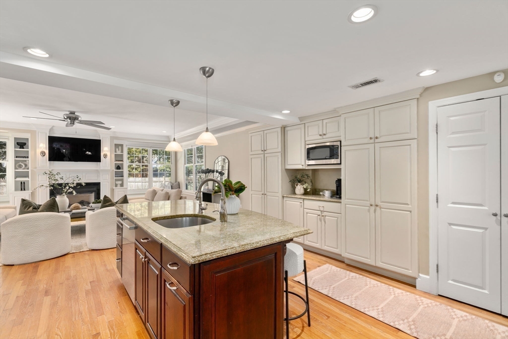 6 Boulder Brook Road Wellesley, MA 02481 - Photo 7 of 34 a kitchen with a sink refrigerator and microwave