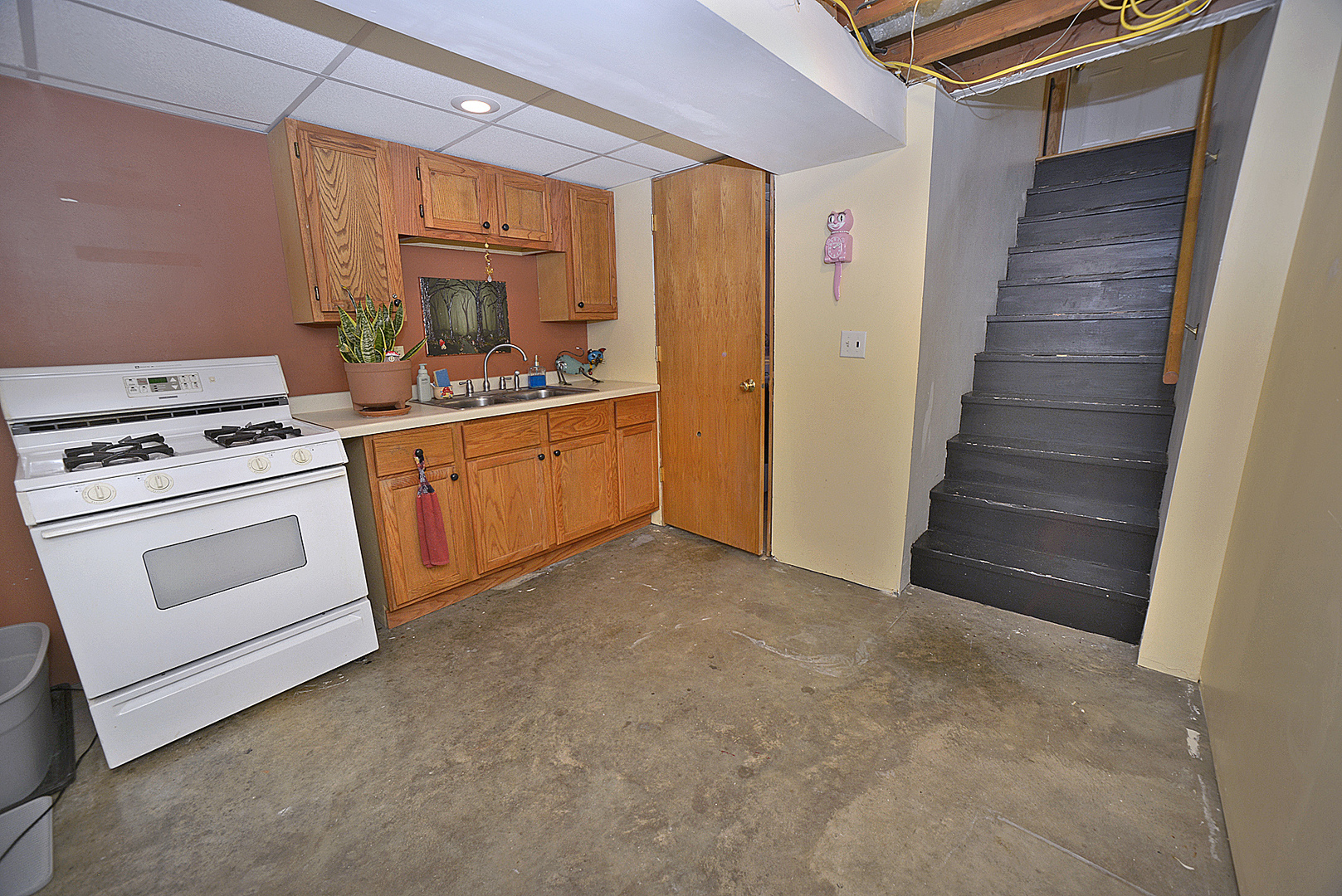1435 Price Street Ottawa, IL 61350 - Photo 12 of 23 a kitchen with white cabinets and white appliances