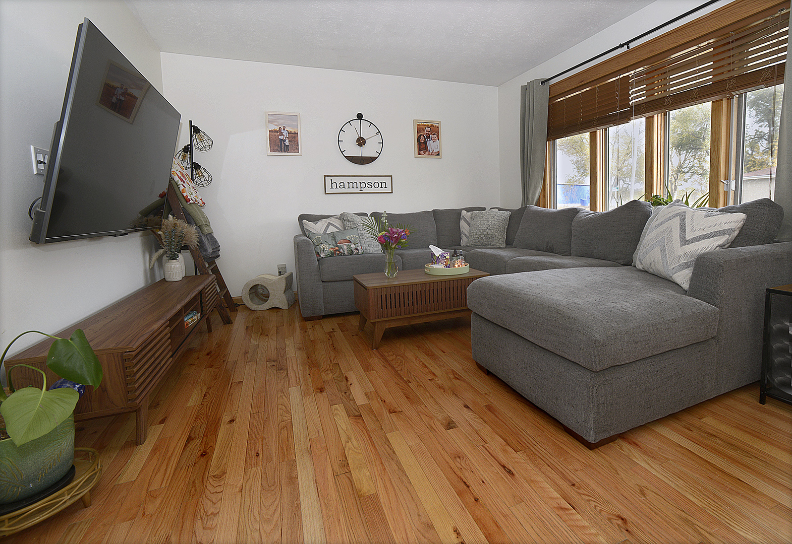 1435 Price Street Ottawa, IL 61350 - Photo 3 of 23 a living room with furniture and a flat screen tv
