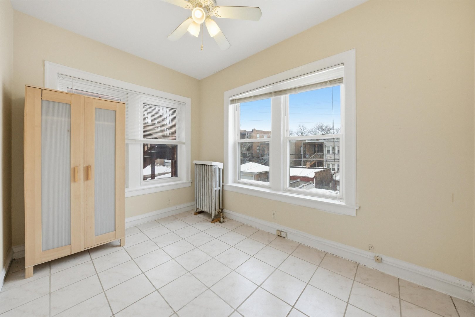 8019 South Rhodes Avenue Chicago, IL 60619 - Photo 40 of 55 a view of an empty room with window
