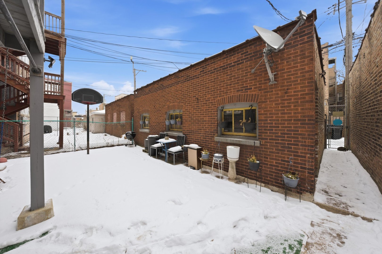 8019 South Rhodes Avenue Chicago, IL 60619 - Photo 45 of 55 a view of a house with a patio