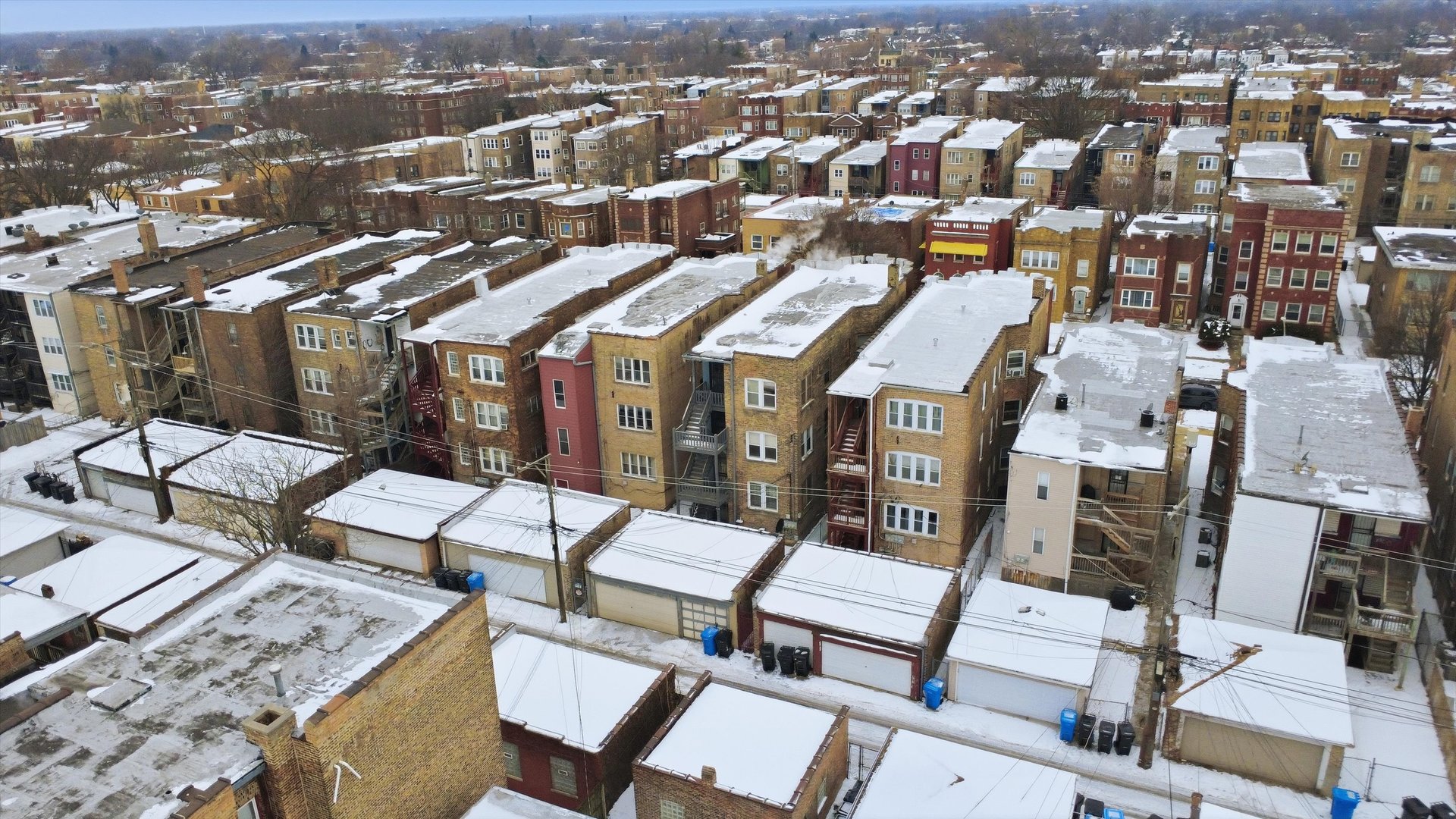 8019 South Rhodes Avenue Chicago, IL 60619 - Photo 50 of 55 an aerial view of a residential apartment building with a city view