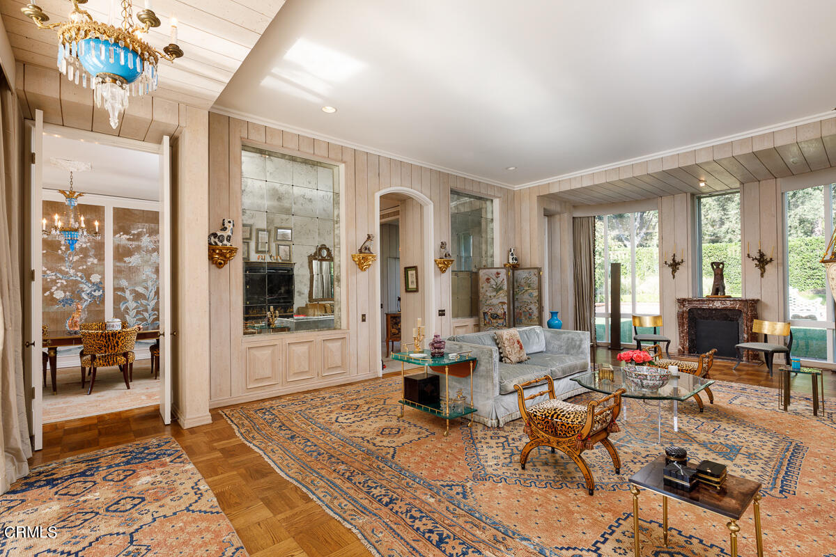 465 South San Rafael Avenue Pasadena, CA 91105 - Photo 12 of 75 a living room with furniture and a table