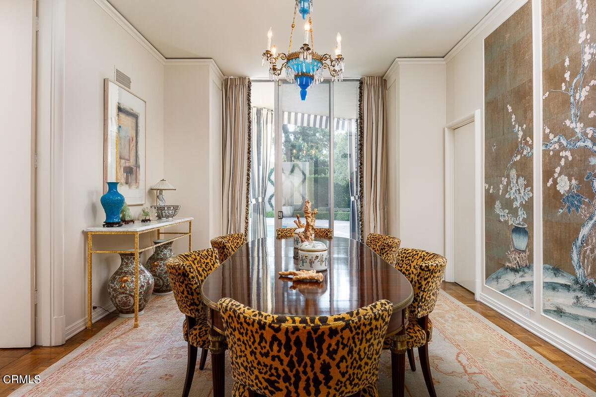 465 South San Rafael Avenue Pasadena, CA 91105 - Photo 14 of 75 a view of a dining room with furniture and a chandelier