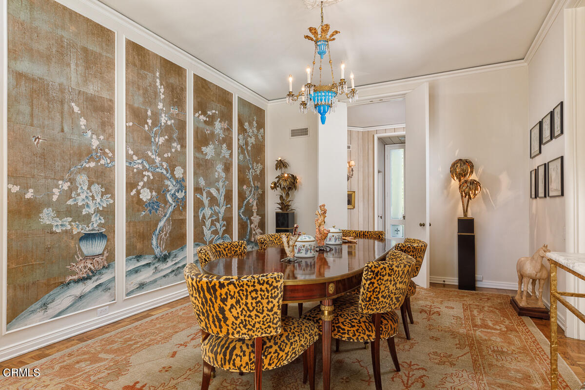 465 South San Rafael Avenue Pasadena, CA 91105 - Photo 16 of 75 a view of a dining room with furniture and chandelier
