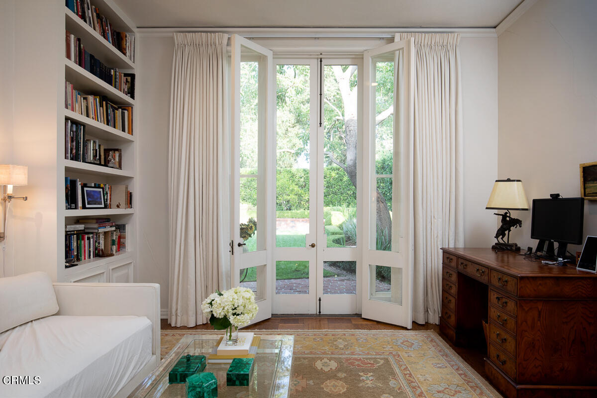 465 South San Rafael Avenue Pasadena, CA 91105 - Photo 30 of 75 a living room with furniture and a flat screen tv