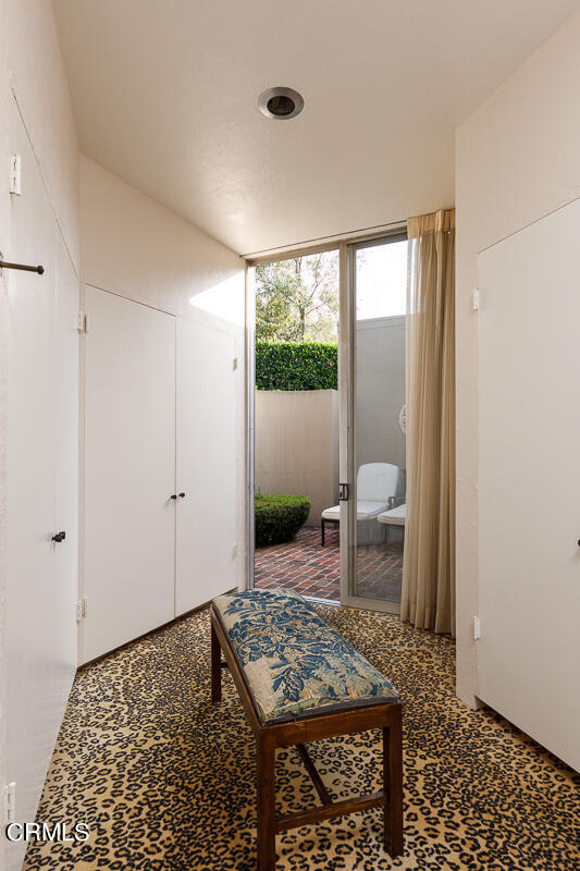 465 South San Rafael Avenue Pasadena, CA 91105 - Photo 34 of 75 a living room with furniture and a rug