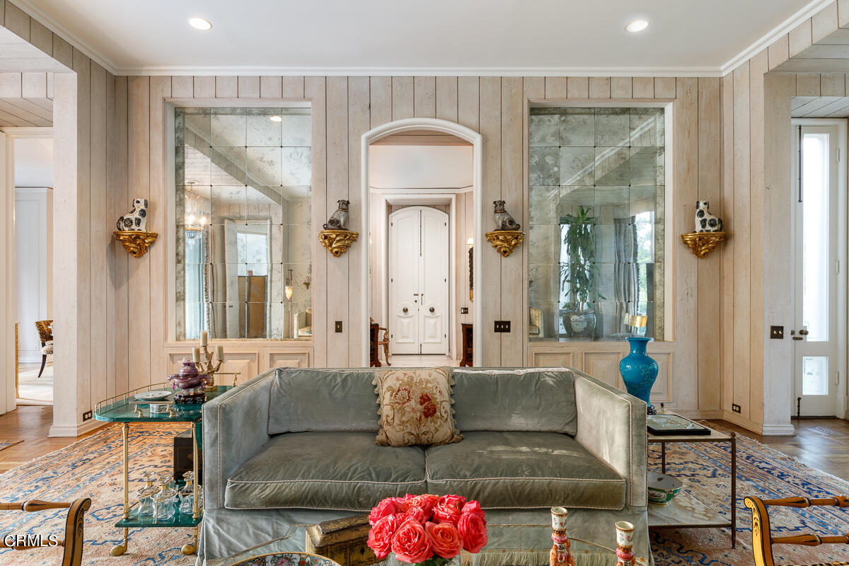 465 South San Rafael Avenue Pasadena, CA 91105 - Photo 5 of 75 a living room with furniture flowers and a chandelier