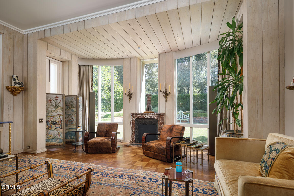 465 South San Rafael Avenue Pasadena, CA 91105 - Photo 7 of 75 a living room with furniture and a floor to ceiling window