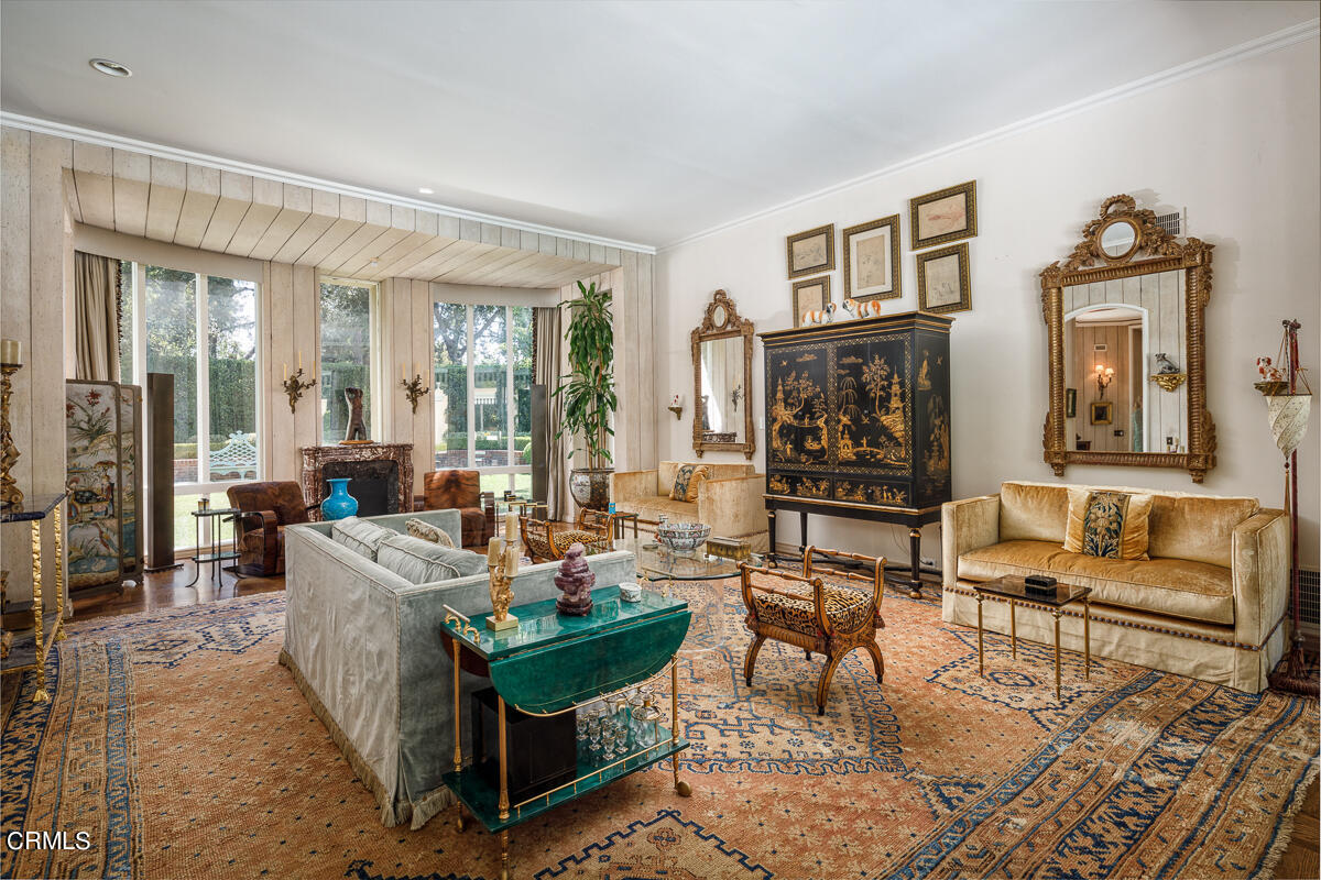 465 South San Rafael Avenue Pasadena, CA 91105 - Photo 8 of 75 a living room with fireplace furniture and two windows