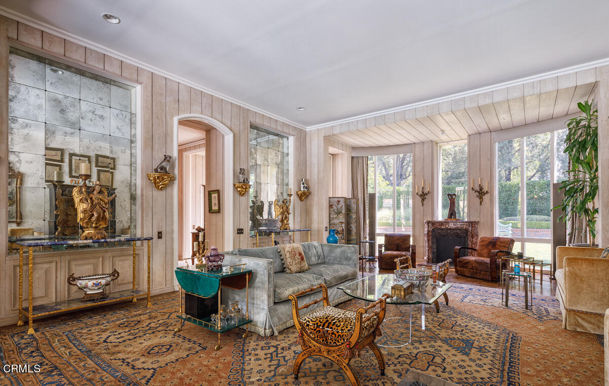 465 South San Rafael Avenue Pasadena, CA 91105 - Photo 9 of 75 a living room with furniture and large windows