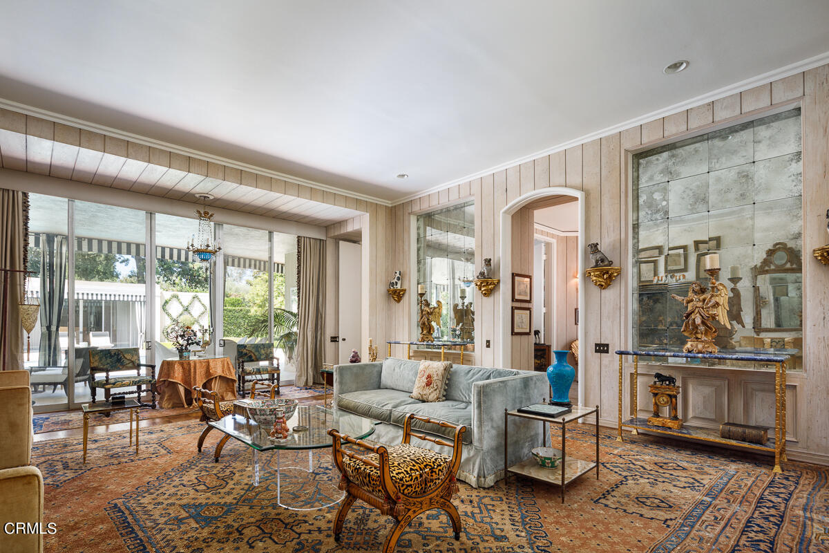 465 South San Rafael Avenue Pasadena, CA 91105 - Photo 10 of 75 a living room with furniture and a floor to ceiling window