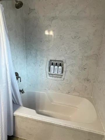 a bathroom with a bathtub