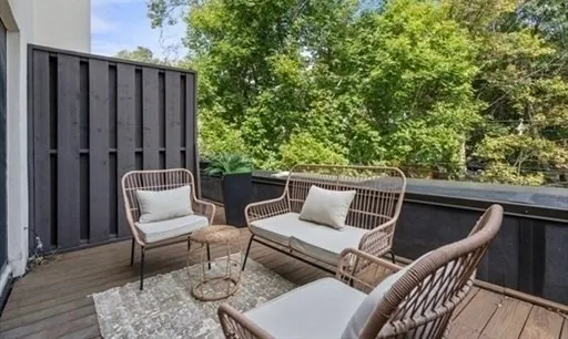 a view of a storage & utility room with a refrigerator