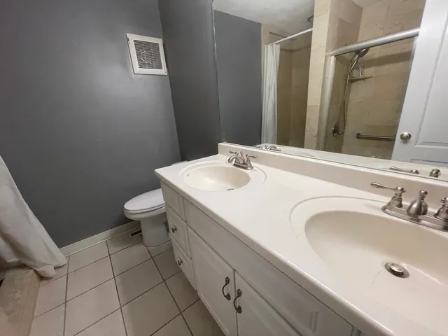 a bathroom with a sink and a toilet