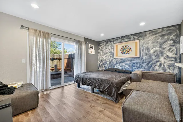 a living room with furniture and a gate