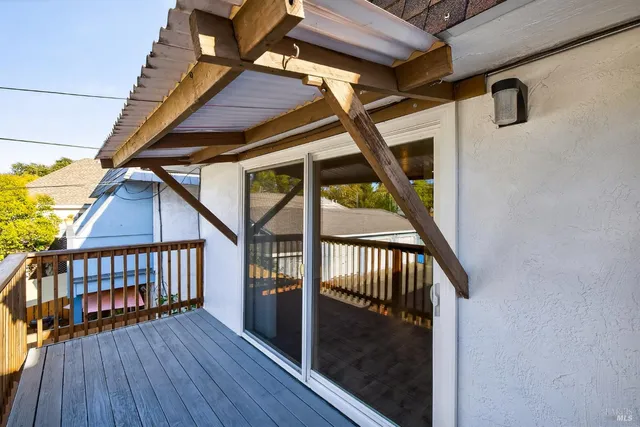 a front view of house with a garden