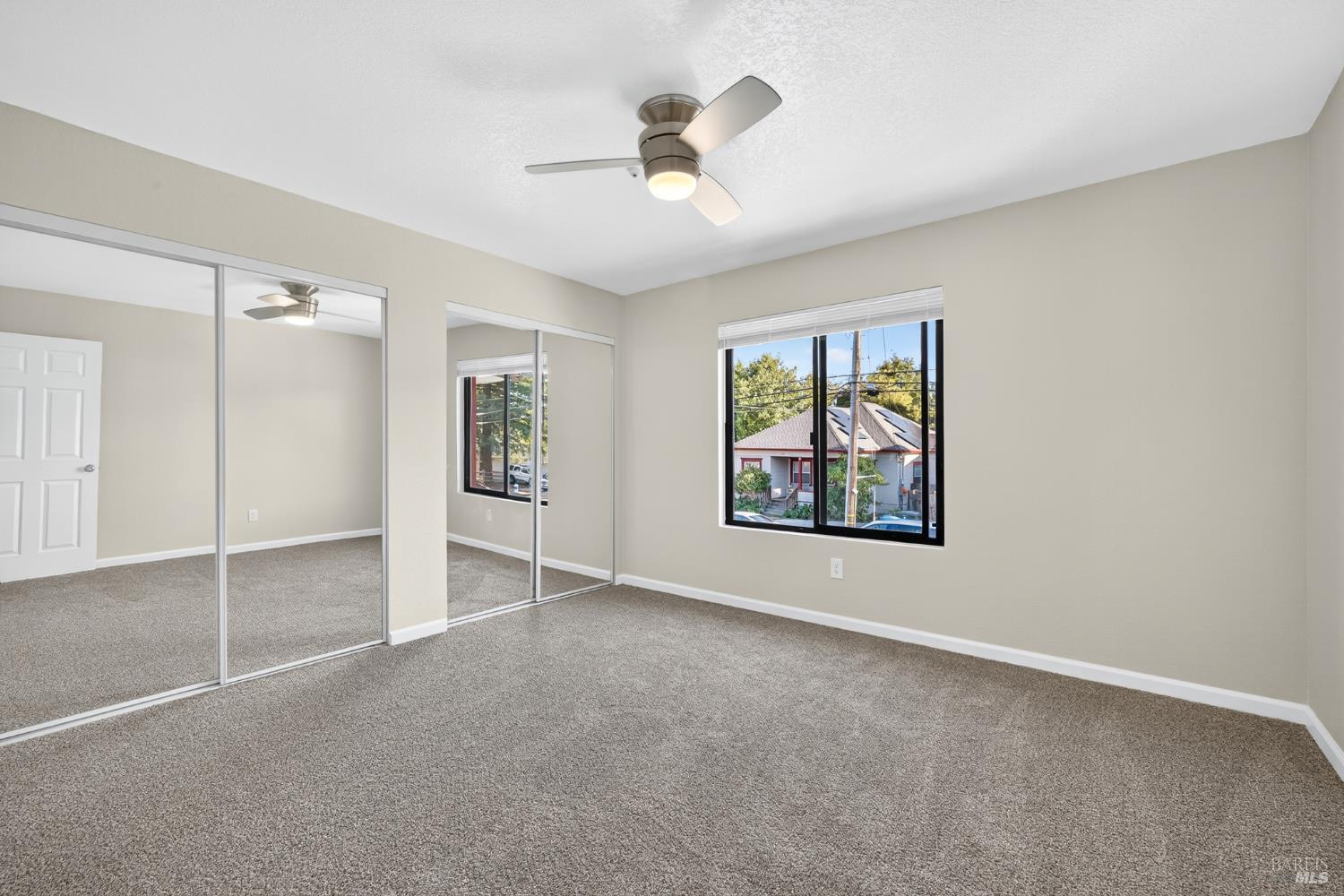 497 Sebastopol Avenue Santa Rosa, CA 95401 - Photo 6 of 42 a view of an empty room with a window
