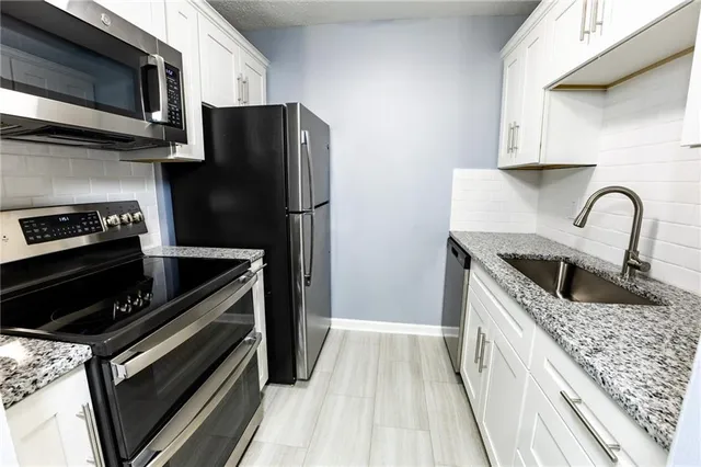 $180,000 | 4518 Holly Street, Unit 37, Kansas City, MO 64111