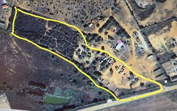 a view of water pool with a bench