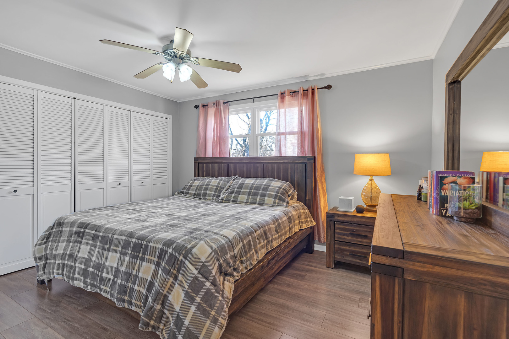 886 West Palatine Road Palatine, IL 60067 - Photo 17 of 27 a bedroom with a bed and wooden floor