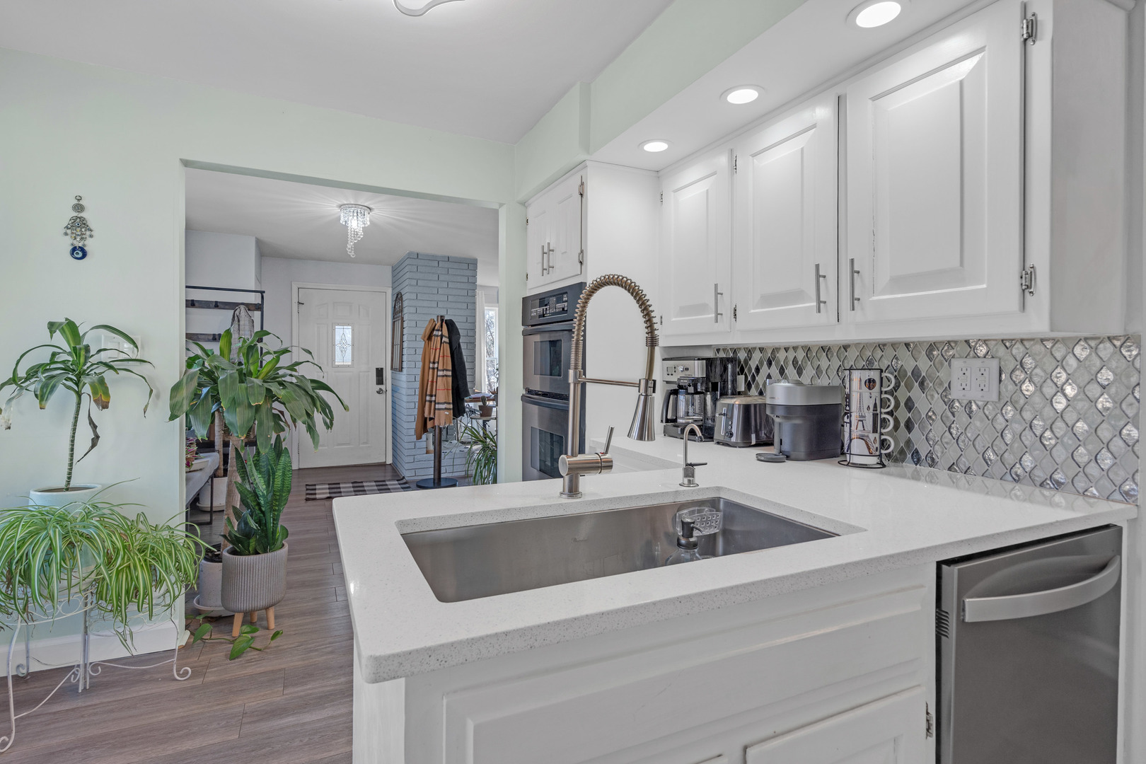 886 West Palatine Road Palatine, IL 60067 - Photo 6 of 27 a kitchen with a sink and a refrigerator