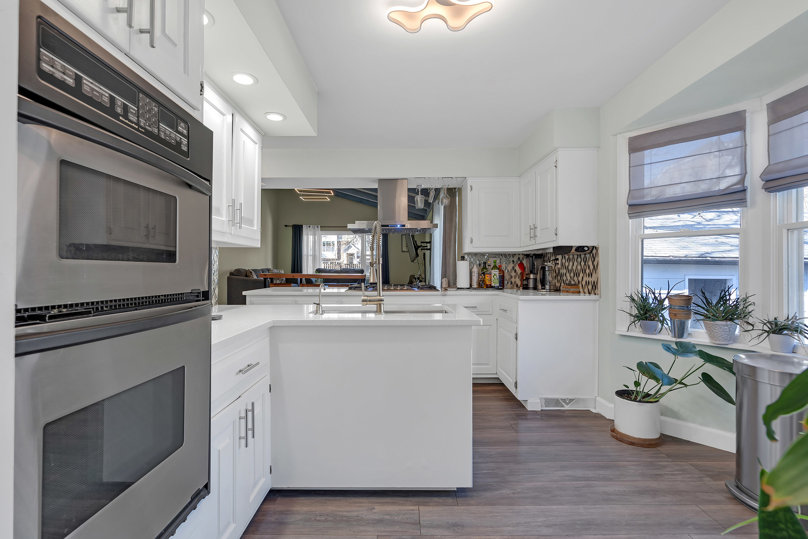 886 West Palatine Road Palatine, IL 60067 - Photo 8 of 27 a kitchen with cabinets and wooden floor