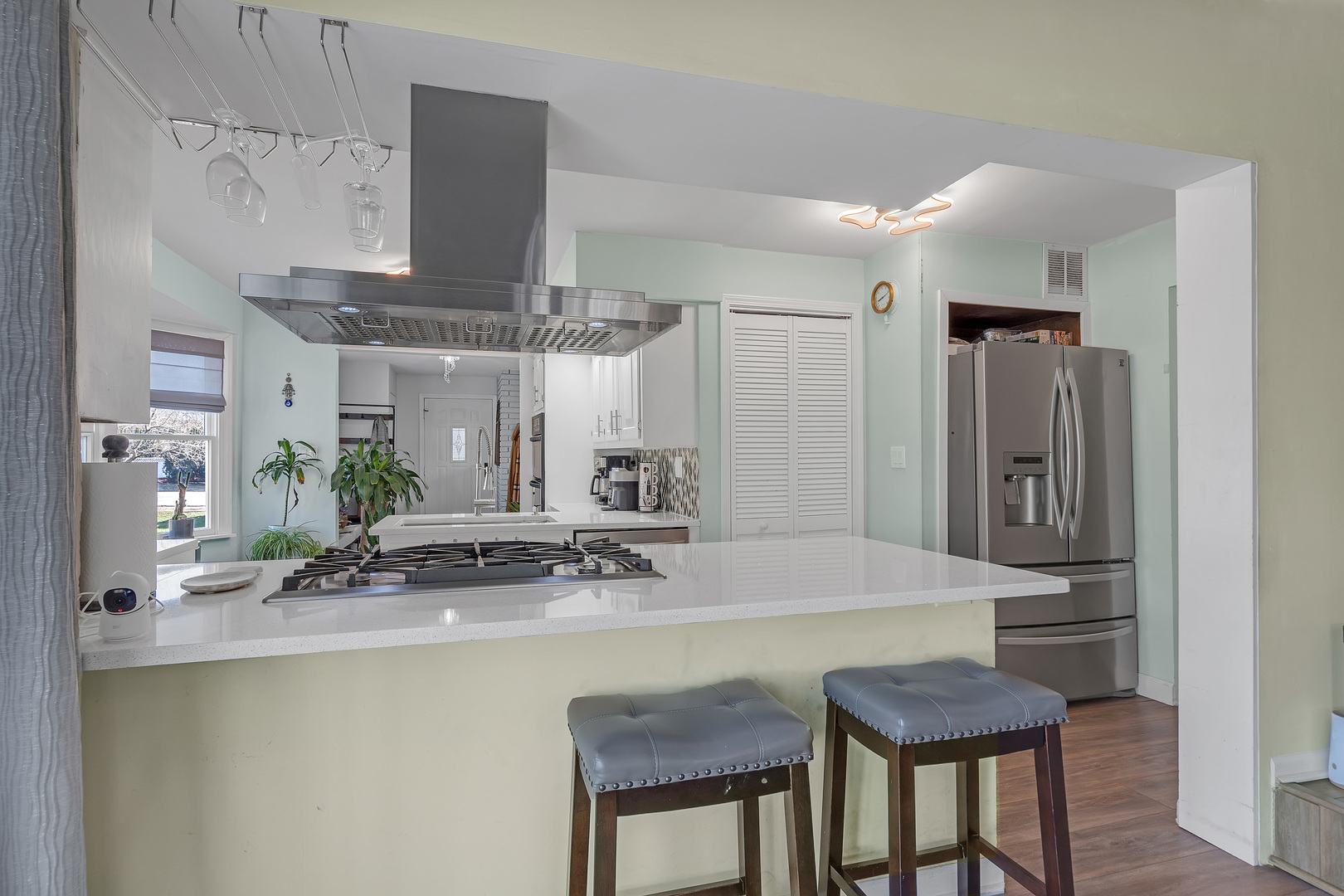 886 West Palatine Road Palatine, IL 60067 - Photo 10 of 27 a kitchen with stainless steel appliances a sink and a refrigerator