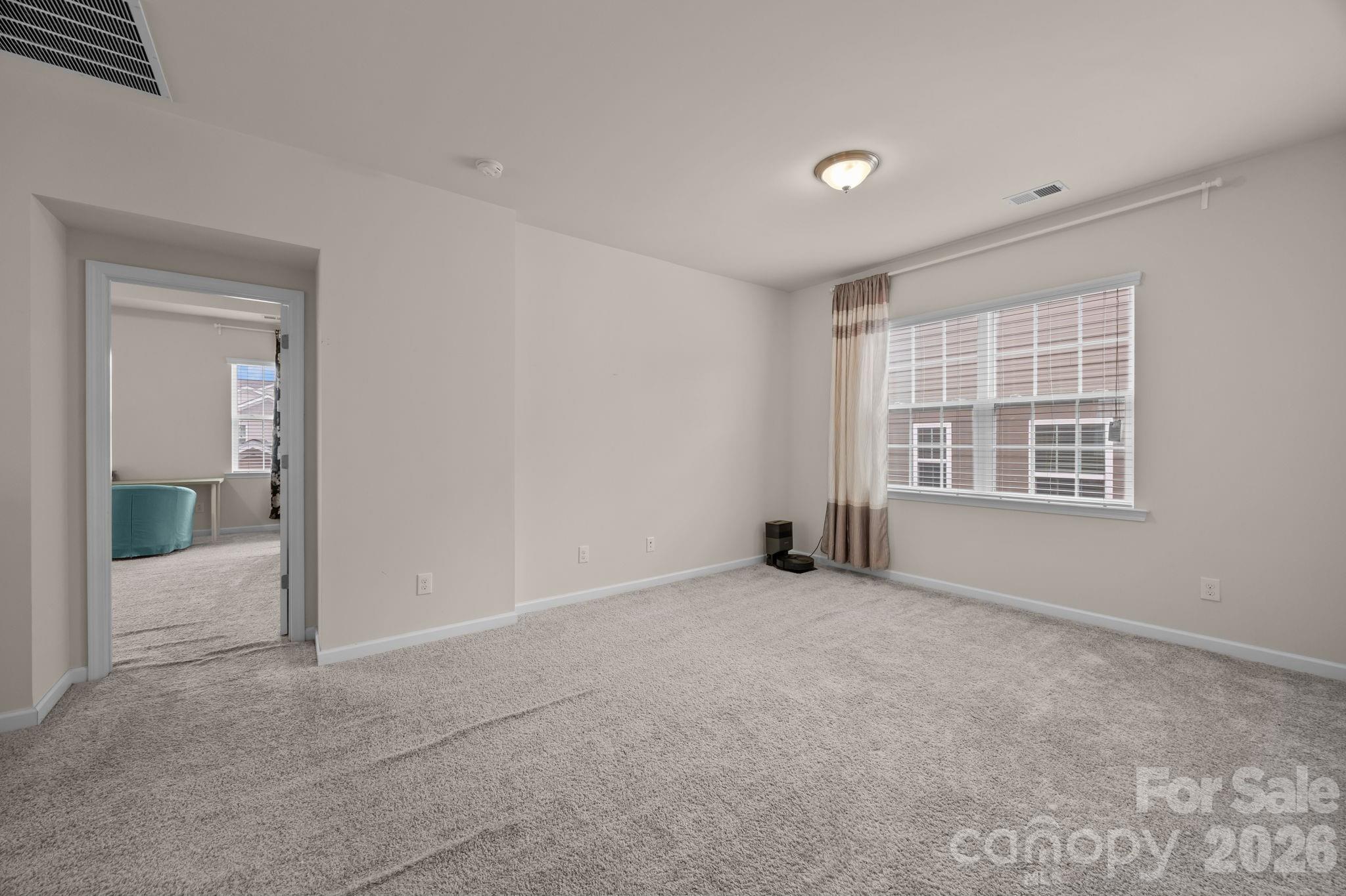 4028 Whittier Lane Tega Cay, SC 29708 - Photo 20 of 46 an empty room with windows