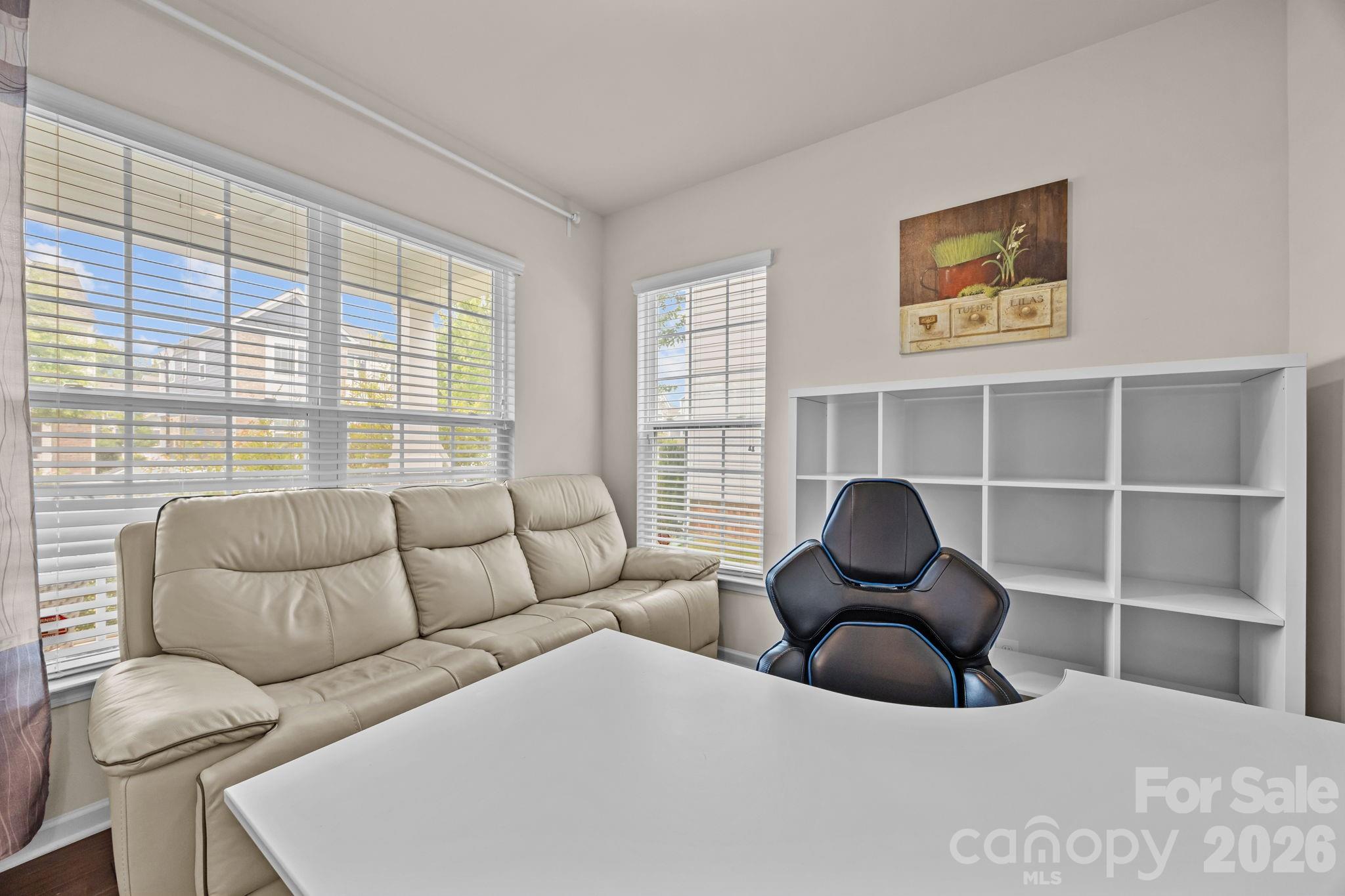 4028 Whittier Lane Tega Cay, SC 29708 - Photo 4 of 46 a living room with furniture and a large window