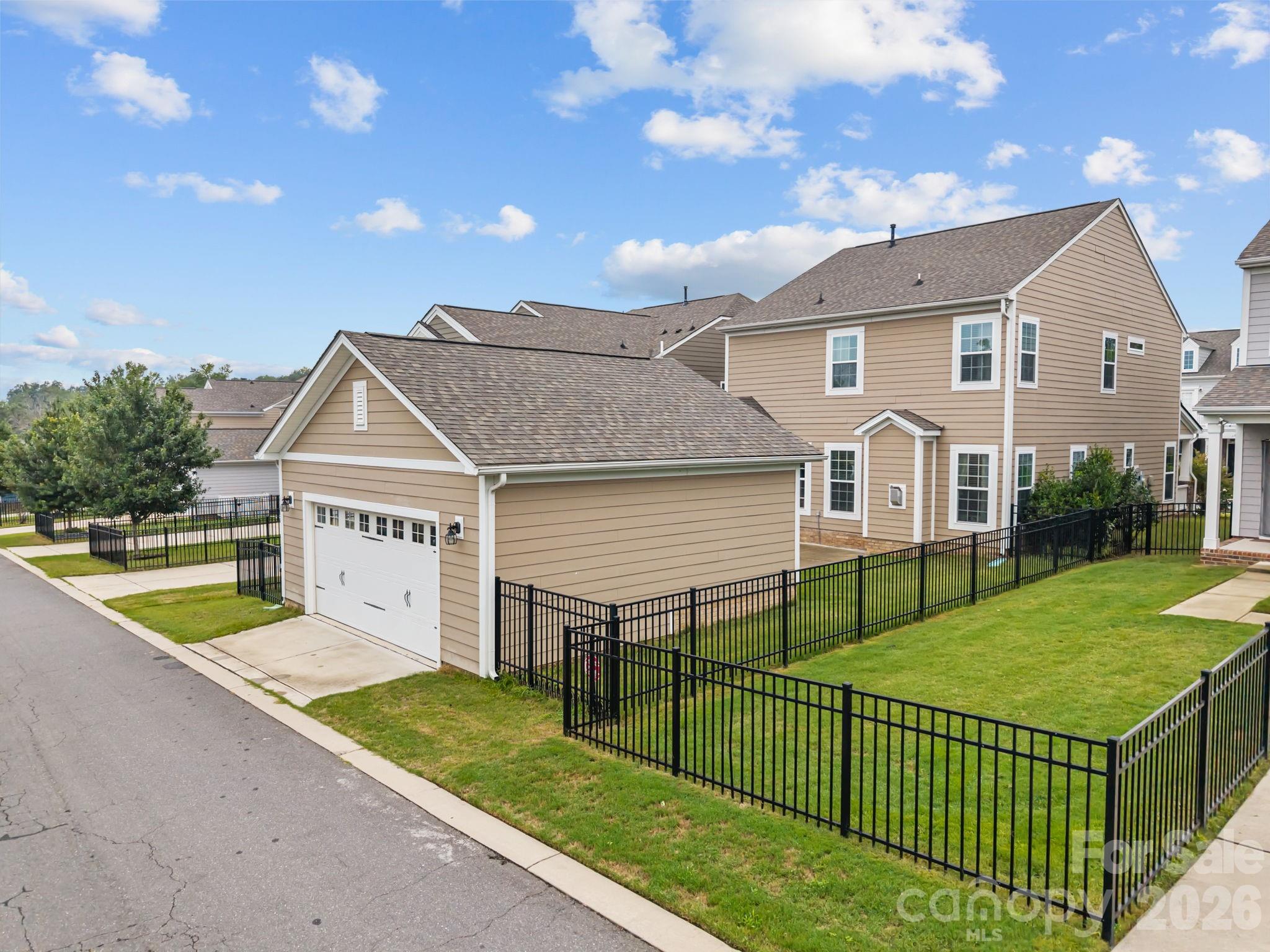 4028 Whittier Lane Tega Cay, SC 29708 - Photo 42 of 46 front view of a house with a yard