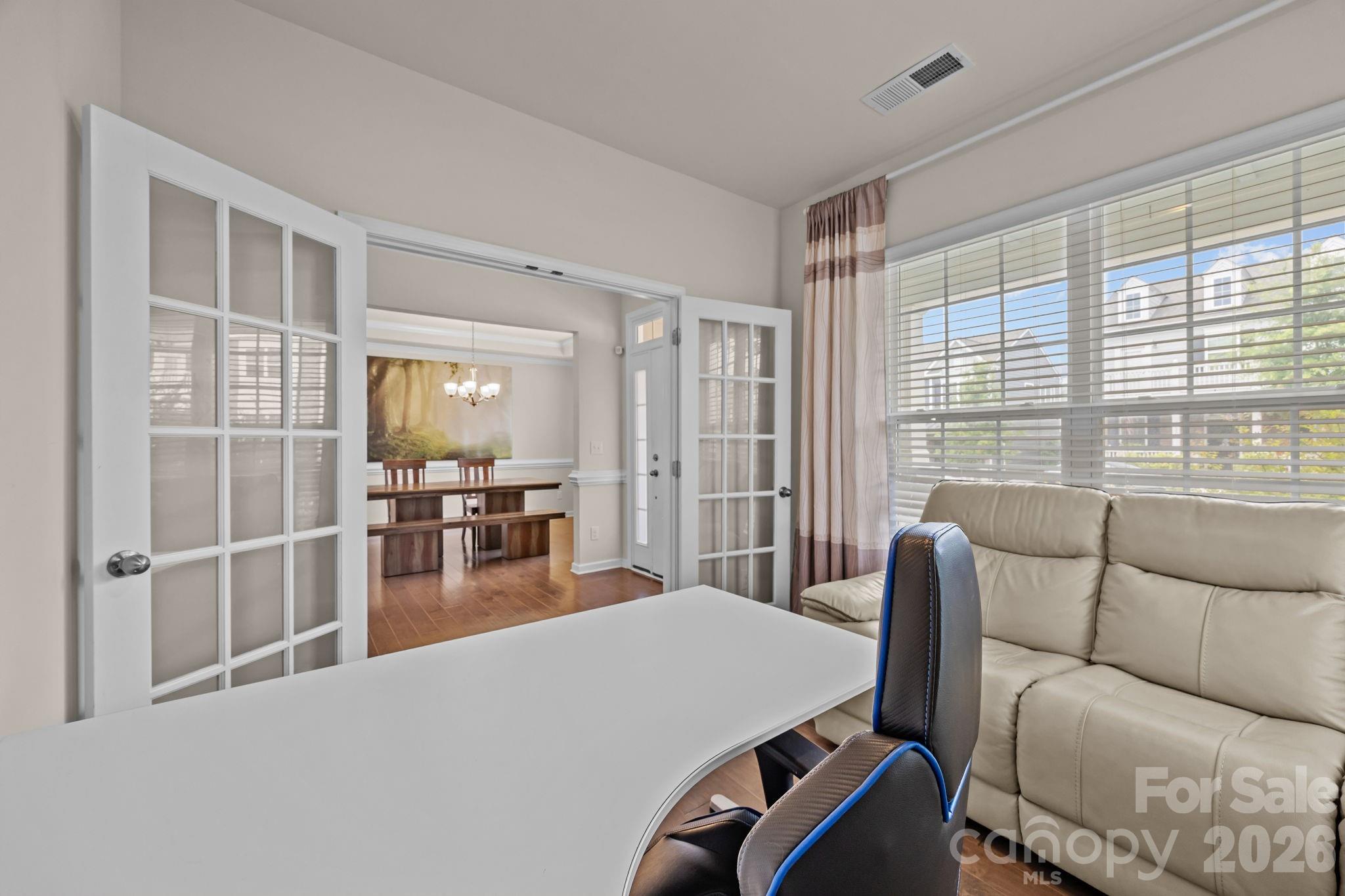 4028 Whittier Lane Tega Cay, SC 29708 - Photo 5 of 46 a living room with furniture and a table