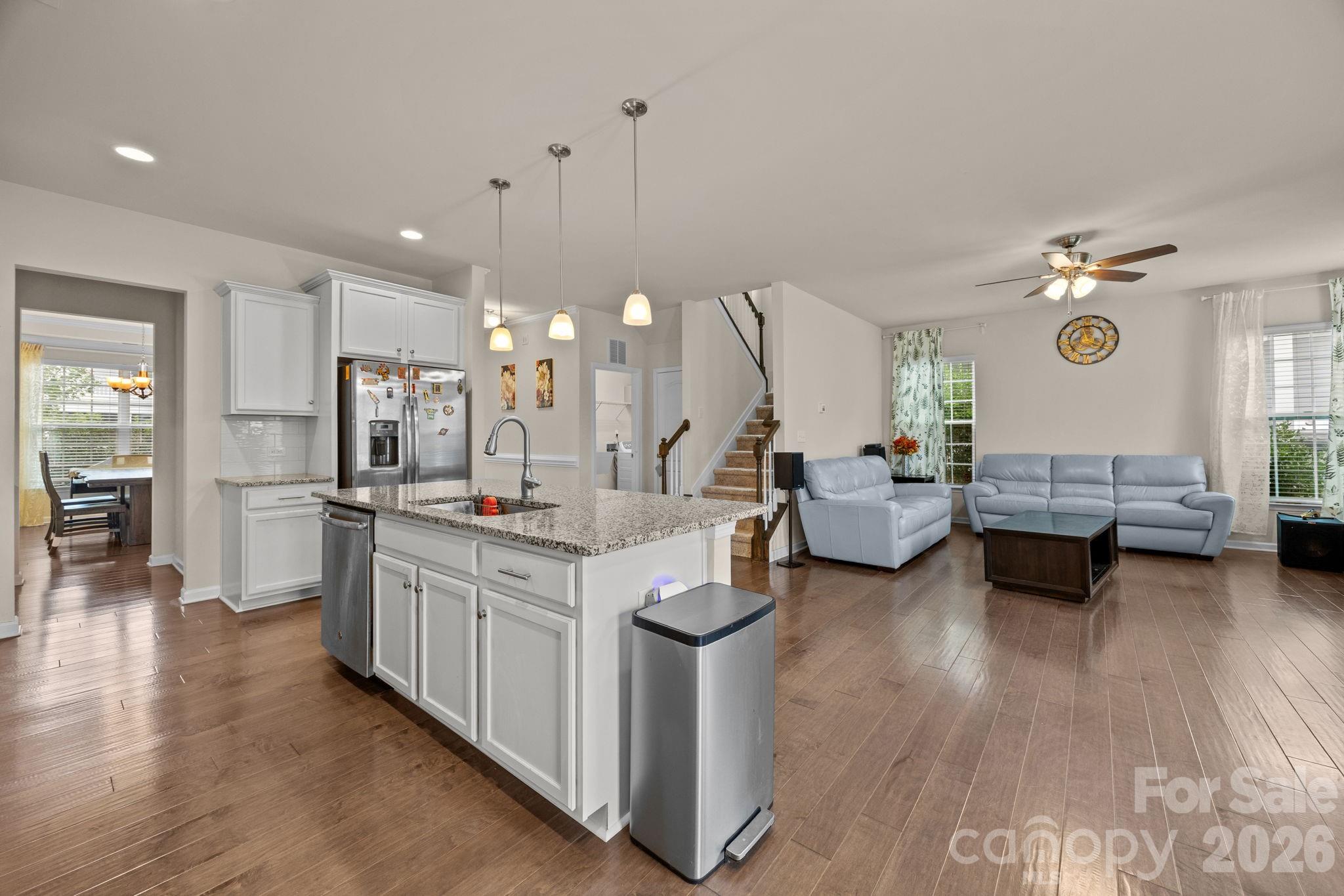 4028 Whittier Lane Tega Cay, SC 29708 - Photo 10 of 46 a view of a living room kitchen and a sink