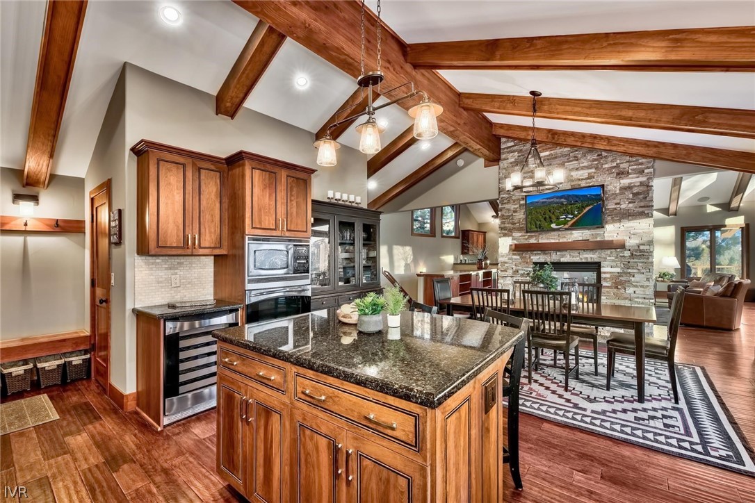 751 Tyner Way Incline Village, NV 89451 - Photo 17 of 29 a kitchen with stainless steel appliances granite countertop a stove refrigerator and cabinets